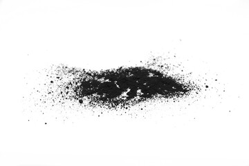Black powder (Charcoal powder) scattered. Isolated on white background. A loose heap of fine Powdered charcoal. 