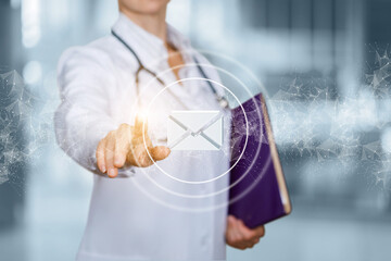 Doctor clicks on an email icon.
