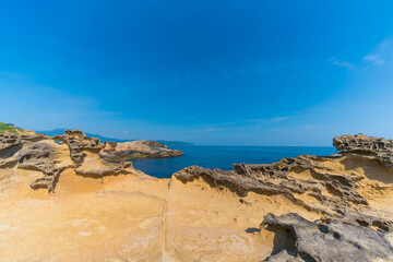 Fototapeta na wymiar Taiwan’s Yehliu Geopark, beautiful fantastic ancient rock field in coastline