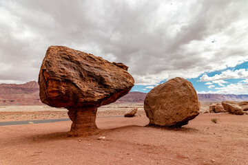 Giant series of boulders under th beautiful clouds and sky, Vermillion cliff range, Page, AZ, USA