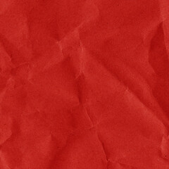 Red vintage and old looking crumpled paper background. Retro cardboard texture. Grunge paper for drawing. Ancient book page. Present wrapping.