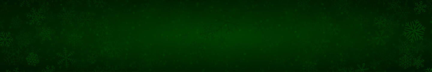 Christmas banner of snowflakes of different shapes, sizes and transparency on dark green background