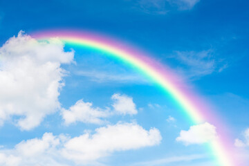 blue sky and clouds with rainbow
