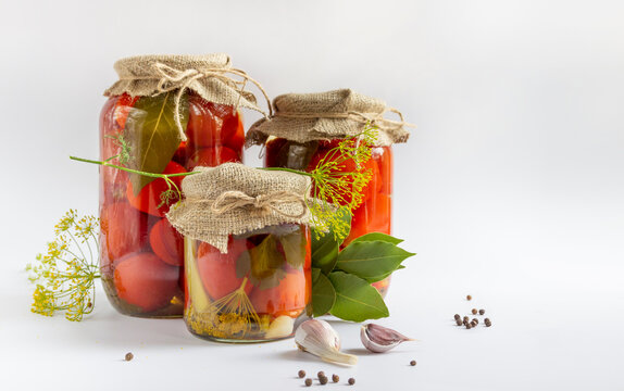 Glass Jars With Homemade Pickled Tomatoes, Sealed With Metal Lid