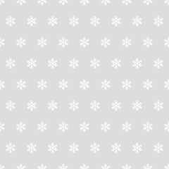Vector seamless pattern of hand drawn snowflakes, polka dot style. Simple design for Christmas wrappings, textile and backgrounds