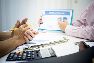 businessman working use present for Economic outlook  in office for discussing documents and ideas , with soft focus, vintage tone