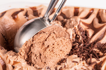 Extreme close up of triple chocolate ice cream being scooped out