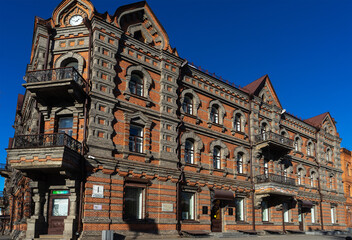 Brick building on Muravyov-Amursky street in Khabarovsk, Far East, Russia