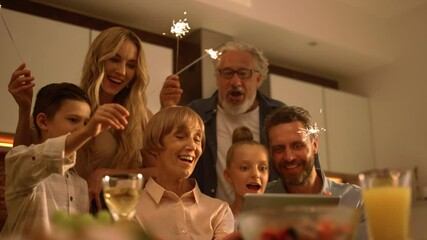 Big family singing christmas song at camera during online video call - Powered by Adobe