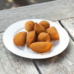 Salgados, salgadinhos, brazilian snacks and party finger food, rissoles, coxinhas, bolinhas de queijo.