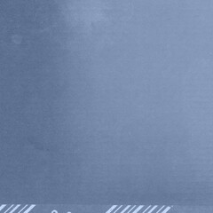 A blue vintage rough sheet of carton. Recycled environmentally friendly cardboard paper texture. Simple minimalist papercraft background.