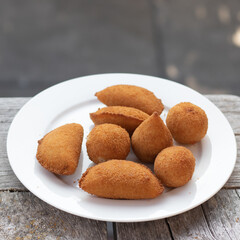 Salgados, salgadinhos, brazilian snacks and party finger food, rissoles, coxinhas, bolinhas de queijo.
