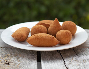 Salgados, salgadinhos, brazilian snacks and party finger food, rissoles, coxinhas, bolinhas de queijo.