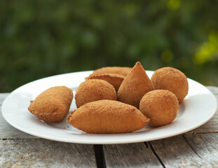 Salgados, salgadinhos, brazilian snacks and party finger food, rissoles, coxinhas, bolinhas de queijo.