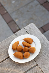 Salgados, salgadinhos, brazilian snacks and party finger food, rissoles, coxinhas, bolinhas de queijo.