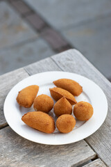 Salgados, salgadinhos, brazilian snacks and party finger food, rissoles, coxinhas, bolinhas de queijo.