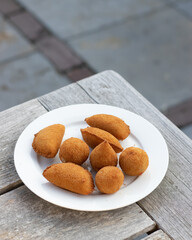 Salgados, salgadinhos, brazilian snacks and party finger food, rissoles, coxinhas, bolinhas de queijo.