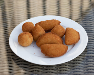 Salgados, salgadinhos, brazilian snacks and party finger food, rissoles, coxinhas, bolinhas de queijo.