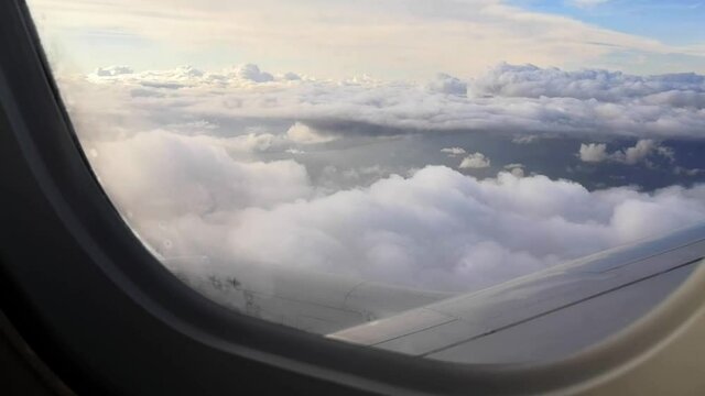 Airplane window view during landing to Amsterdam 
