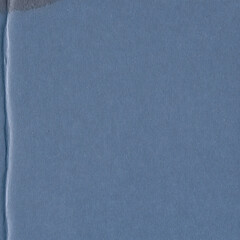 A blue vintage rough sheet of carton. Recycled environmentally friendly cardboard paper texture. Simple minimalist papercraft background.