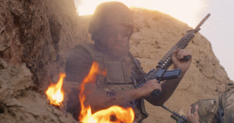Scared soldier firing gun in air