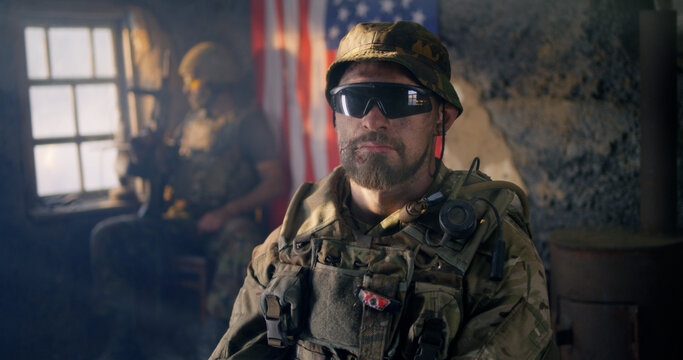 Confident American soldier in desolate building