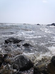 stones at beach with beautiful sea water