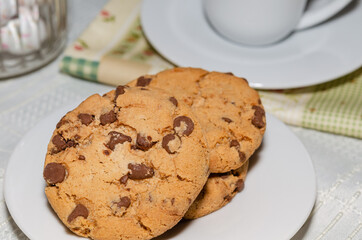 Homemade chocolate chip cookies with a cup of coffee