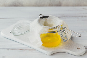 Preparation of Ghee or a clarified butter. Healthy fat diet concept