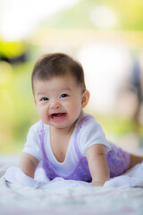 happy adorable asian baby close up