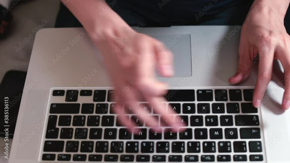 Poster close-up of working with a computer keyboard. fingers are typing the text of the message to the offi