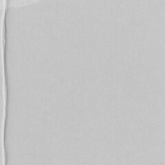 White vintage rough sheet of carton. Recycled environmentally friendly cardboard paper texture. Simple gray minimalist papercraft background.