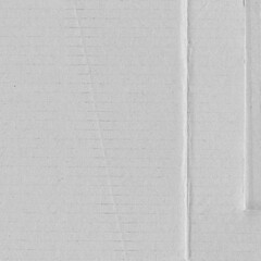 White vintage rough sheet of carton. Recycled environmentally friendly cardboard paper texture. Simple gray minimalist papercraft background.