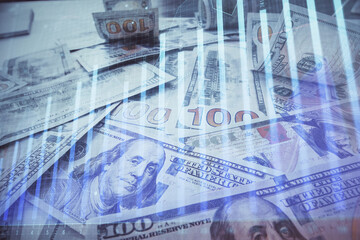 Multi exposure of forex chart drawing over us dollars bill background. Concept of financial success markets.