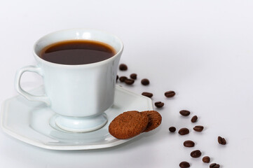 Hexagonal coffee cups with coffee beans on white background. With space for text. View from