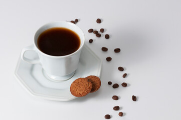 Hexagonal coffee cups with arabica coffee beans produced in Brazil on white background. With space for text. Top view