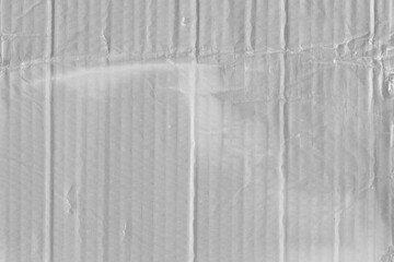 Obraz premium White vintage rough sheet of carton. Recycled environmentally friendly cardboard paper texture. Simple gray minimalist papercraft background.