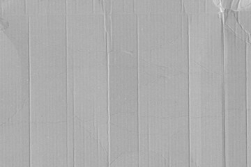 White vintage rough sheet of carton. Recycled environmentally friendly cardboard paper texture. Simple gray minimalist papercraft background.