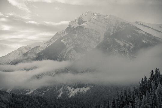 Black and white image of a mountain photographed from the Trans Canada Highway between Calgary and Banff.