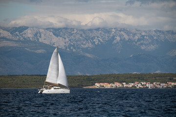 Catamaran sailing on Adriatic sea clos