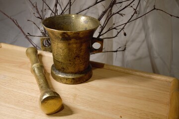 antique mortar and pestle made of bronze