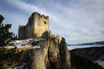 Fototapeta na wymiar Lietava Castle ruins view by winter, Slovakia