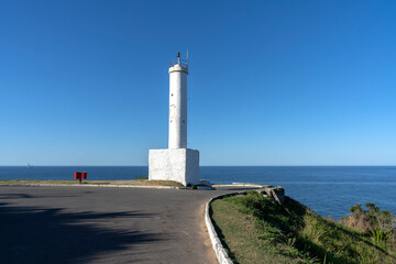 Beautiful view of the lighthouse and the sea. Ponta Negra Lighthouse. The city of Ponta Negra, State of Rio de Janeiro, Brazil. 