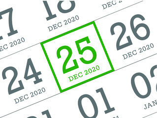 Close up of Christmas day 2021 on diary calendar. Wishing you wonderful memories during this joyous season.