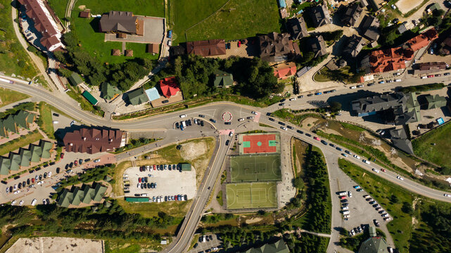 Top down aerial view of urban houses and streets in a residential area of Bukovel, Ukraine