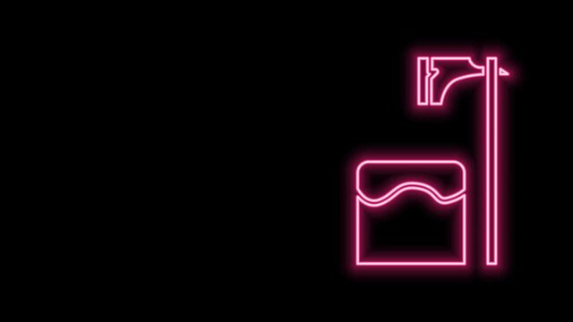 Glowing neon line Executioner axe in tree block icon isolated on black background. Hangman, torturer, executor, tormentor, butcher, headsman. 4K Video motion graphic animation
