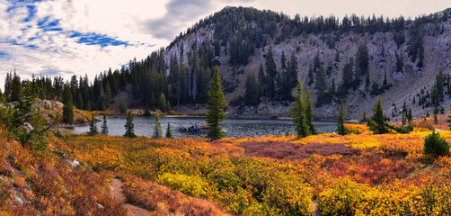 Lake Catherine panorama views from hiking trail to Sunset Peak on the Great Western Trail by Brighton Resort. Rocky Mountains, Wasatch Front, Utah. United States.