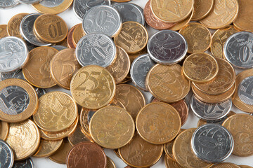 Real currency, money from Brazil. Stack with several Brazilian coins.