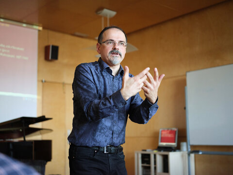 Professor teaching at classroom