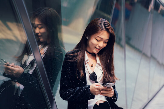 portrait of business woman using a cell phone